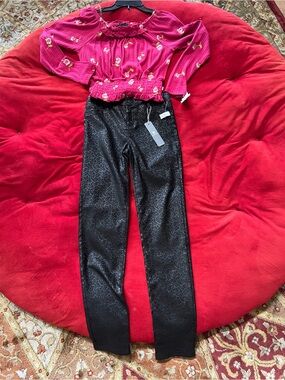 Xtraordinary Hot Pink Embroidered Ruffled Top and black shimmery straight pants